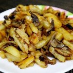 Potatoes with mushrooms and onions in a frying pan - recipes