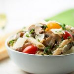 Pasta with tomatoes and mushrooms