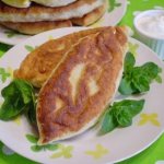 Fried pies with cabbage and mushrooms