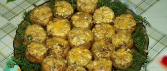 Baked stuffed champignons covered with cheese